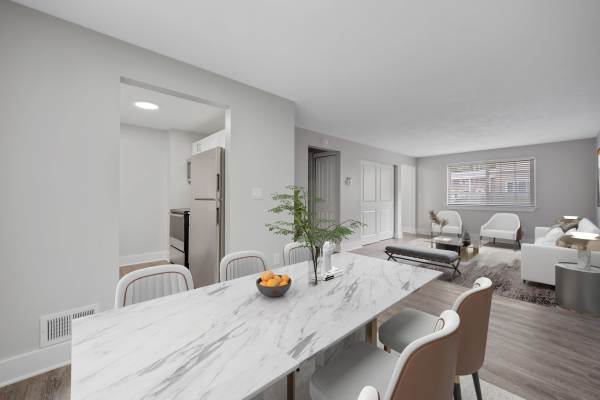 Dining area with view kitchen at Valley Brook Townhomes in Rochester, New York
