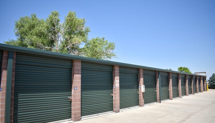 Forest green doors on storage units at a STOR-N-LOCK Self Storage location