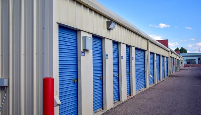 Clean, blue storage unit doors at a STOR-N-LOCK Self Storage location