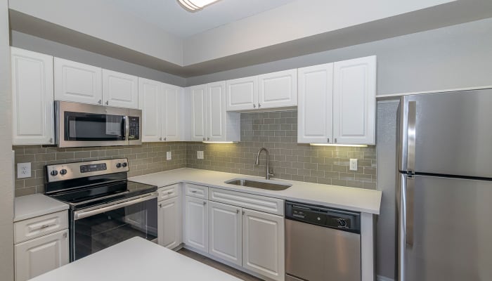 Bright kitchen with plenty of counter space at The Lyndon in Irving, Texas
