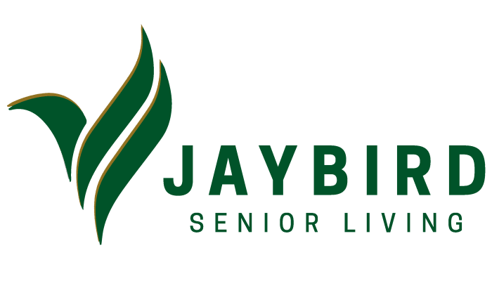 Jaybird Senior Living logo at Arlington Place of Grundy Center in Grundy Center, Iowa