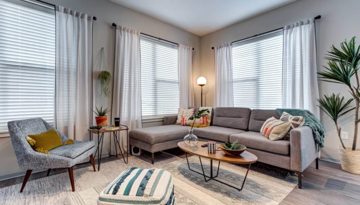 A furnished apartment living room at The Banks in Coralville, Iowa