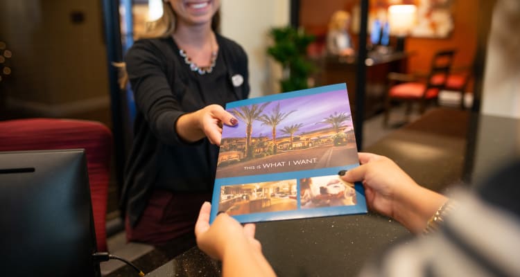 Resident getting some cardio exercise in the fitness center at San Villante in Mesa, Arizona