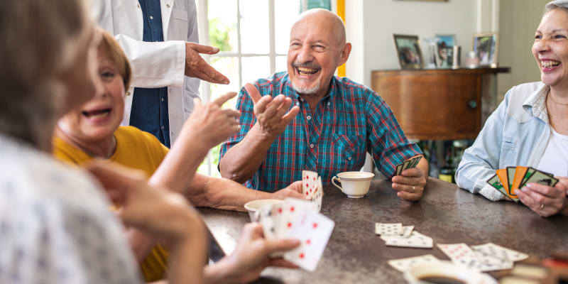 Residents playing cards at Barclay House of Aiken in Aiken, South Carolina