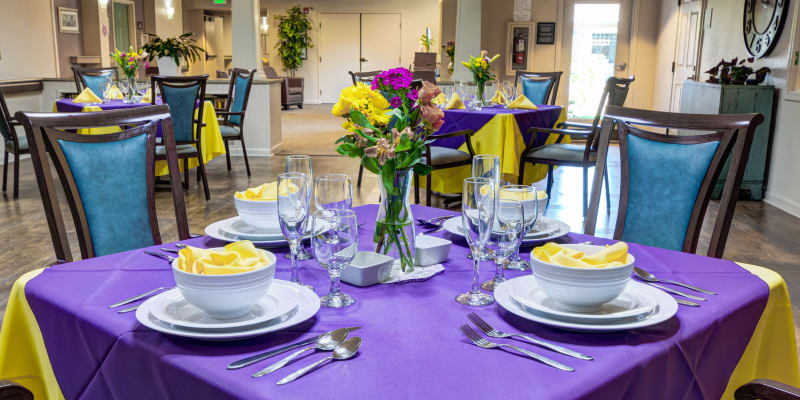 Dining table set for dinner at Timberwood Court Memory Care in Albany, Oregon