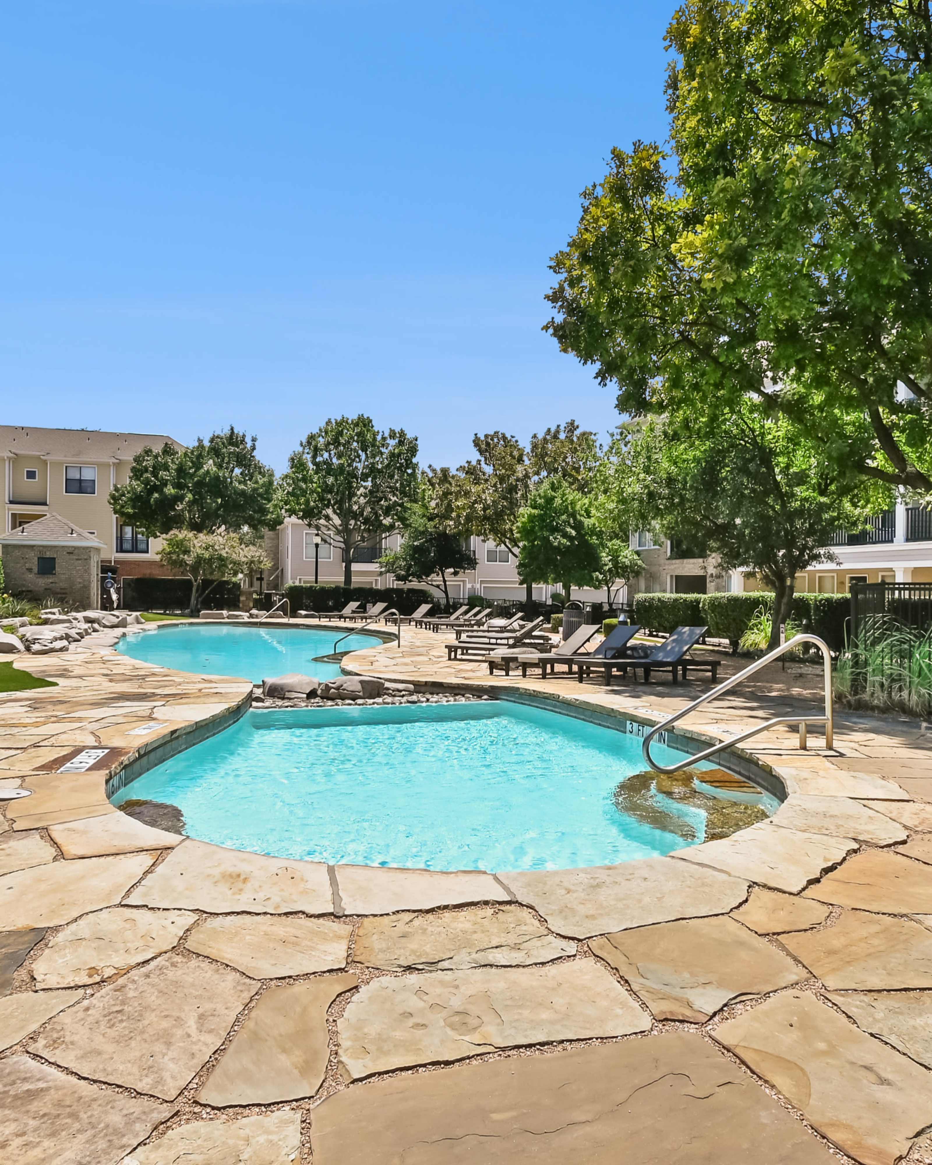 Covered seating in the park at Arbor Hills at Flatiron District at Austin Ranch in The Colony, Texas