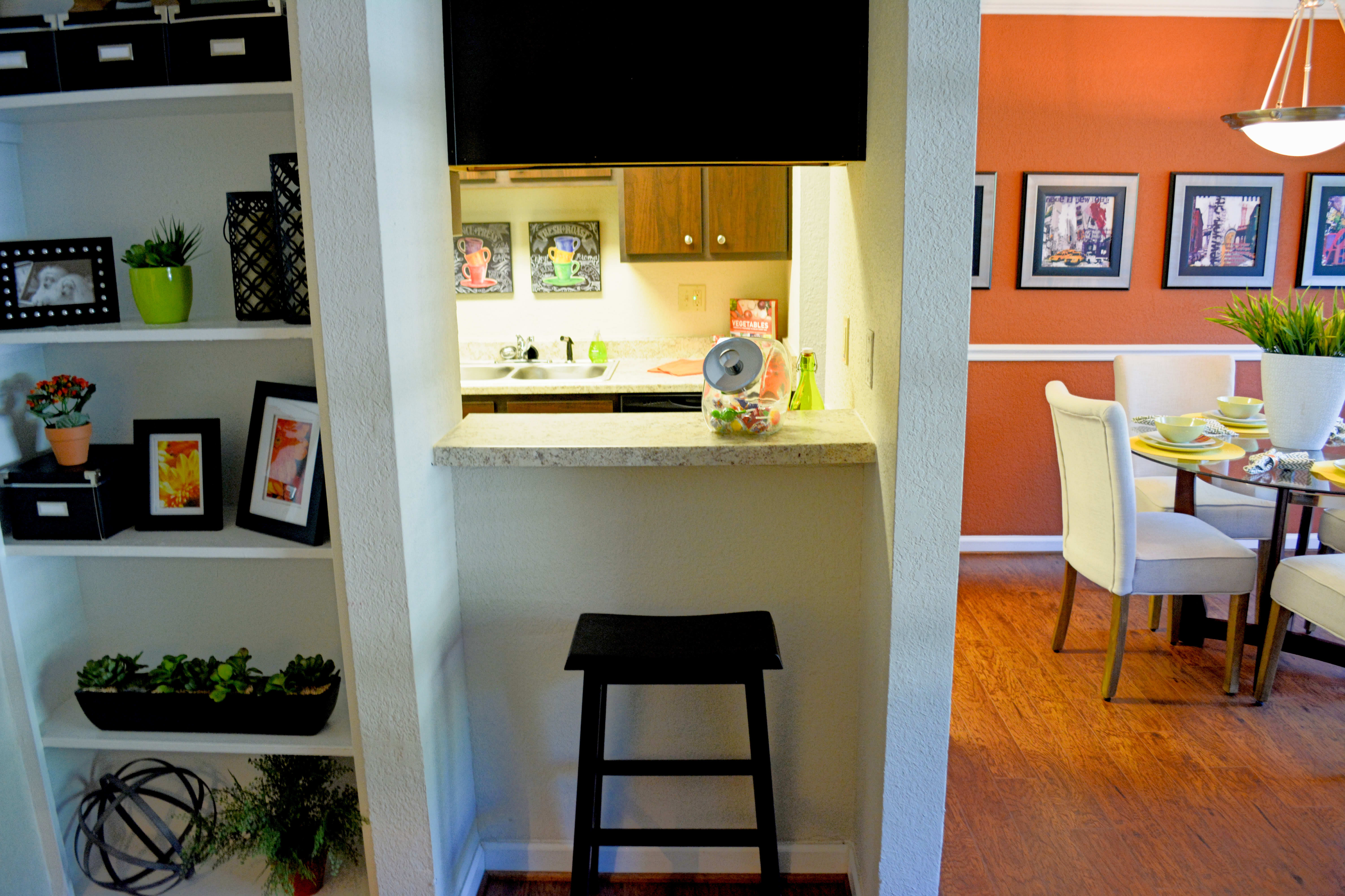 Modern kitchen and dining room at The Abbey at Champions in Houston