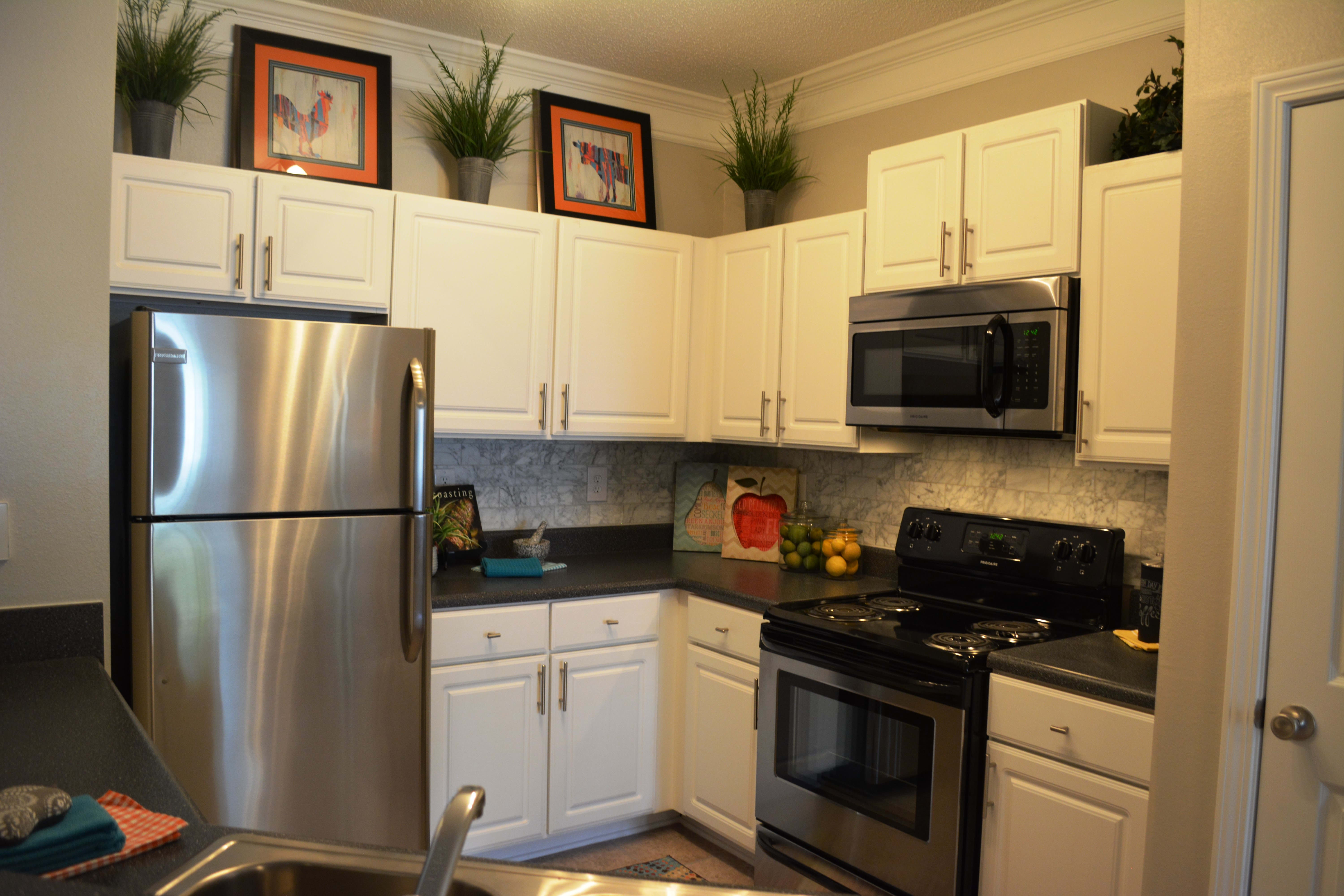 Modern kitchen at The Abbey at Eagles Landing apartments in Stockbridge