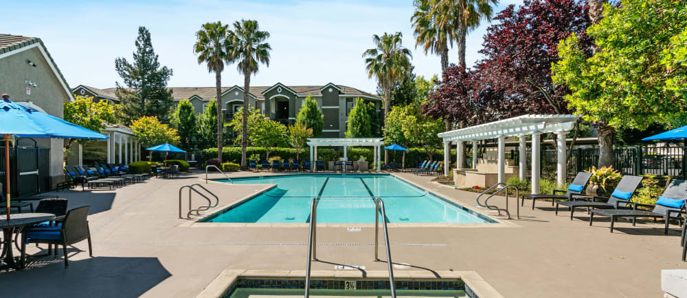 The perfect place to relax, at the resort-style pool at Hawthorn Village Apartments in Napa, California