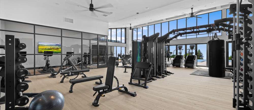 Universal gym with machines, free weights, and cycle room The Highlands at Silverdale in Silverdale, Washington