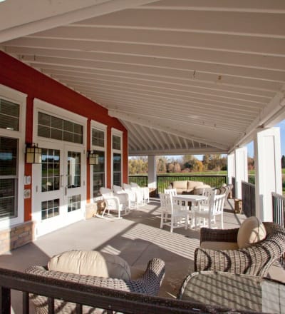 Covered outdoor seating at Keystone Place at LaValle Fields in Hugo, Minnesota