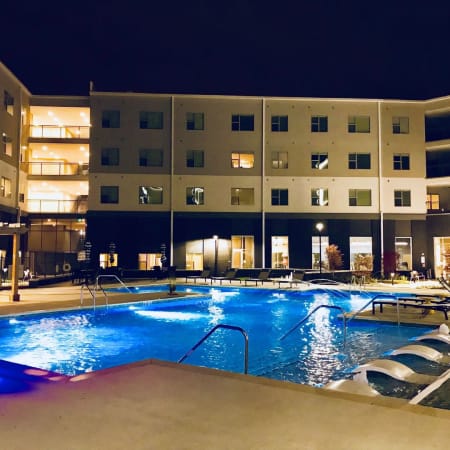 The pool lit at night at Argon in Oklahoma City, Oklahoma
