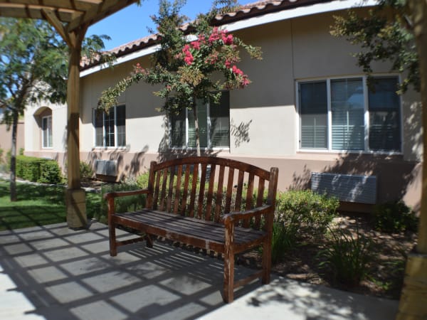 A shaded bench at The Lakes at Banning in Banning, California. 