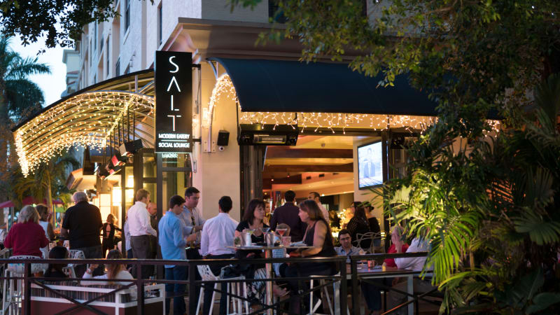 People dining at a local restaurant near Delray Station in Delray Beach, Florida