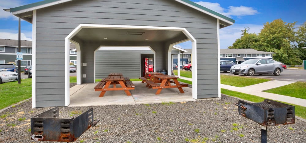 Community gathering area with barbeques at Heights at Sheridan in Bremerton, Washington