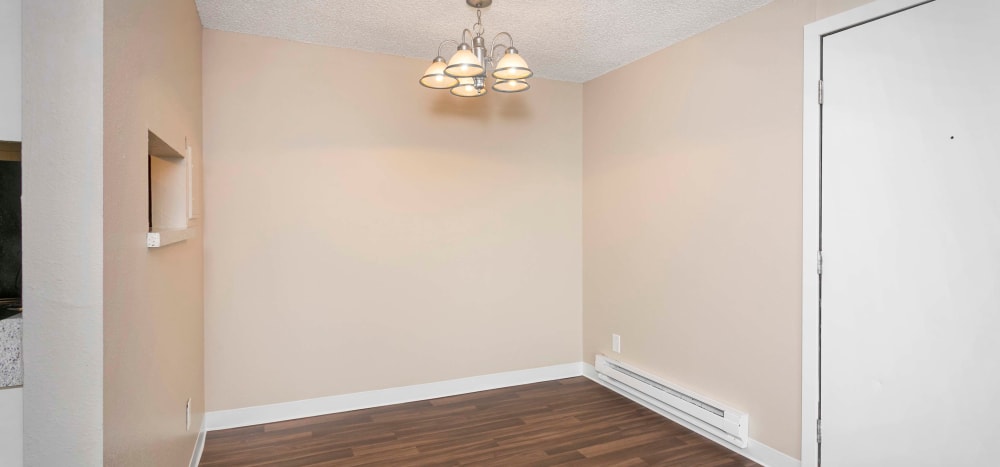Dinning room with lighting fixture at Heights at Sheridan in Bremerton, Washington