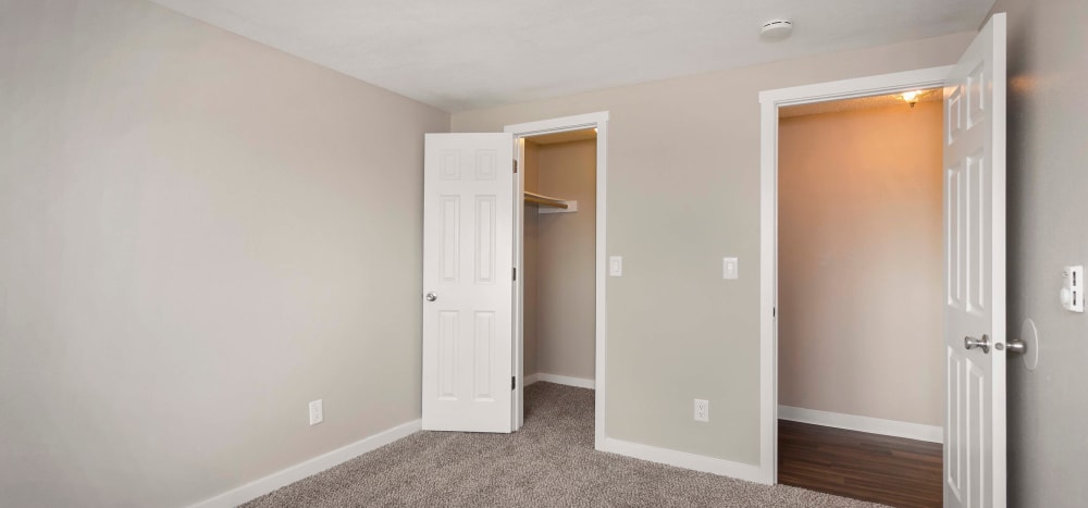 Bedroom with closets at Heights at Sheridan in Bremerton, Washington