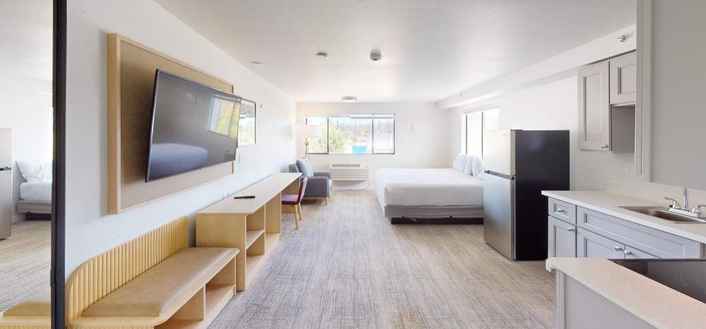 Studio apartments with wall mounted TV at  Thea Apartments in Tacoma, Washington