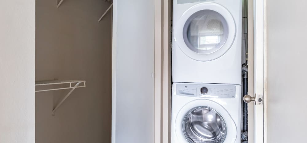 In unit washer and dryer at The Courtyard Apartment Homes in Mukilteo, Washington