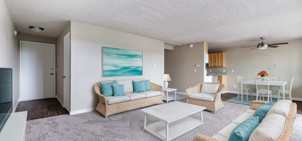 apartments with dining area and living room at The Courtyard Apartment Homes in Mukilteo, Washington