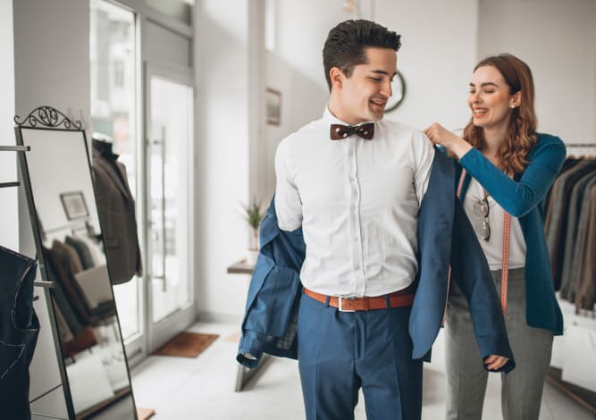 Man trying on a suit in Jacksonville, Florida near Riverside St. Johns