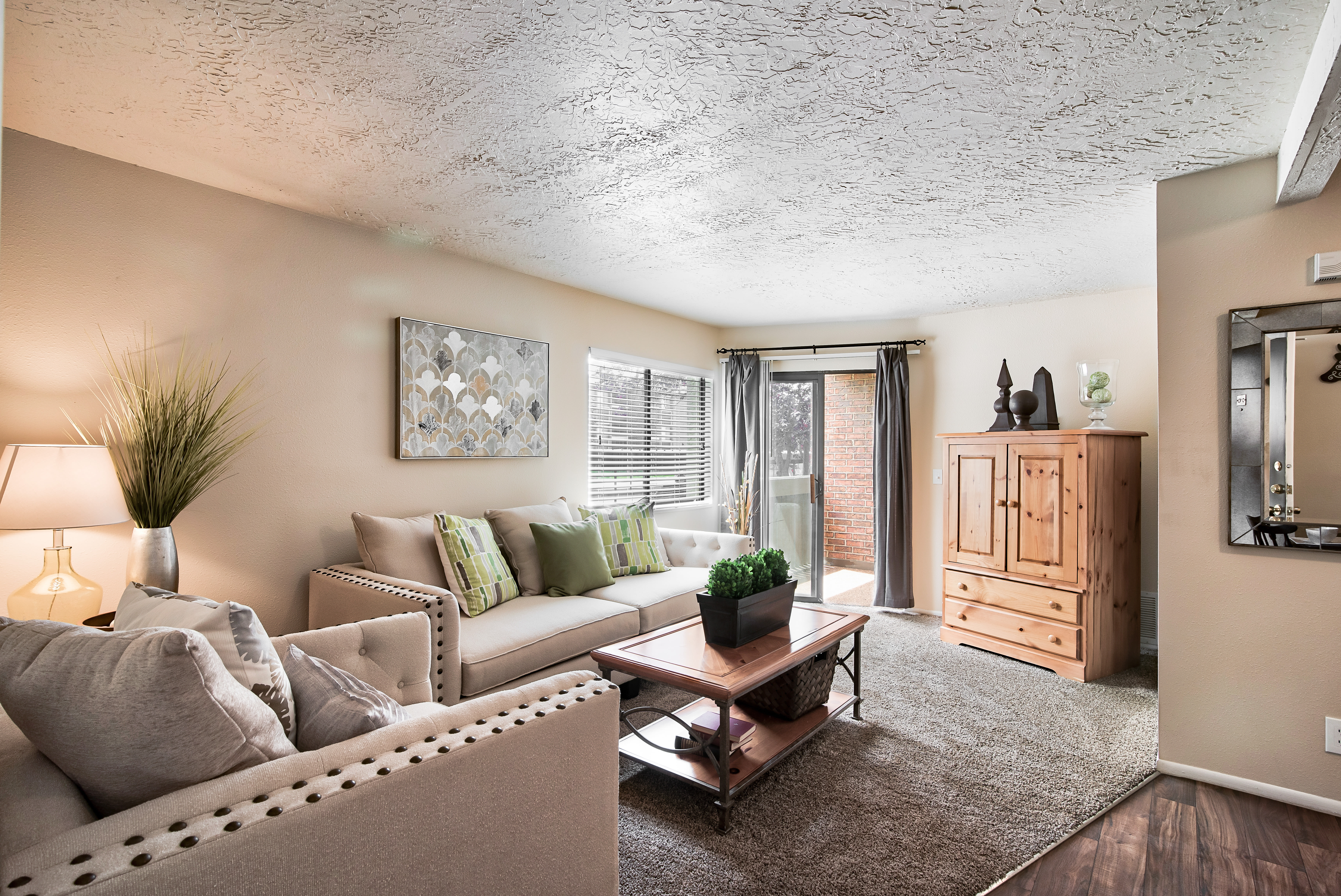 Living Room at Cherry Creek Apartments in Riverdale, UT