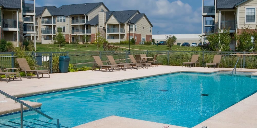 A large community pool at Villas at Stonebridge in Edmond, Oklahoma