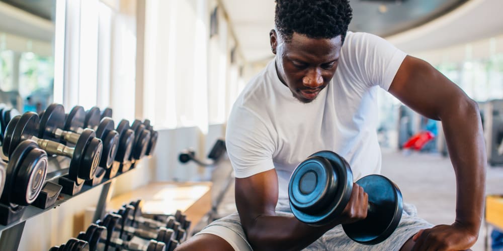 Resident working out at Sugarberry Apartments in Tulsa, Oklahoma