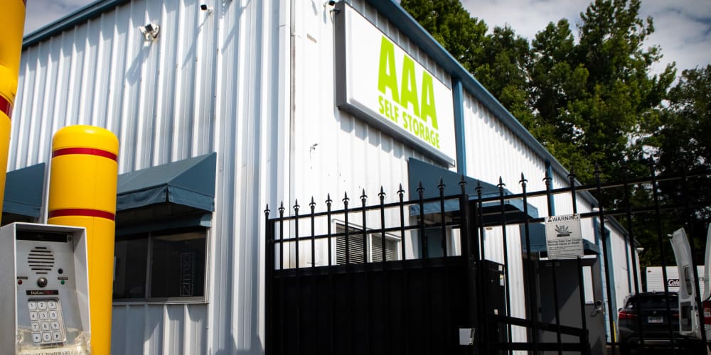 Exterior image of building and gate at AAA Self Storage at Griffith Rd in Winston Salem, North Carolina