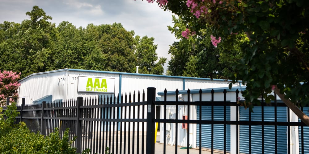 Exterior image of gate and exterior storage units AAA Self Storage at Griffith Rd in Winston Salem, North Carolina