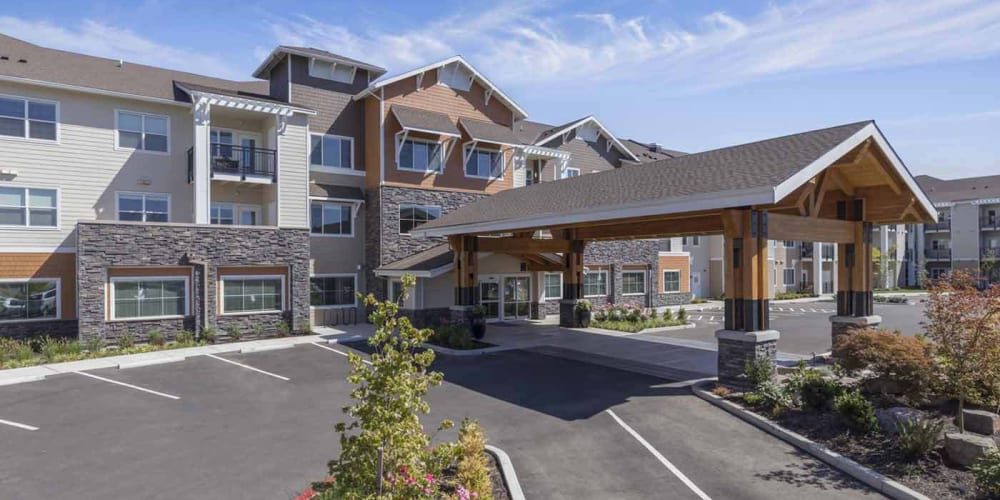Entrance to upscale senior living facility with covered walkway at The Springs at Sherwood in Sherwood, Oregon