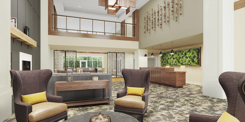 Brightly lit upscale senior living common room complete with wood accents, comfy armchairs, and modern vaulted ceilings at The Springs at Sherwood in Sherwood, Oregon