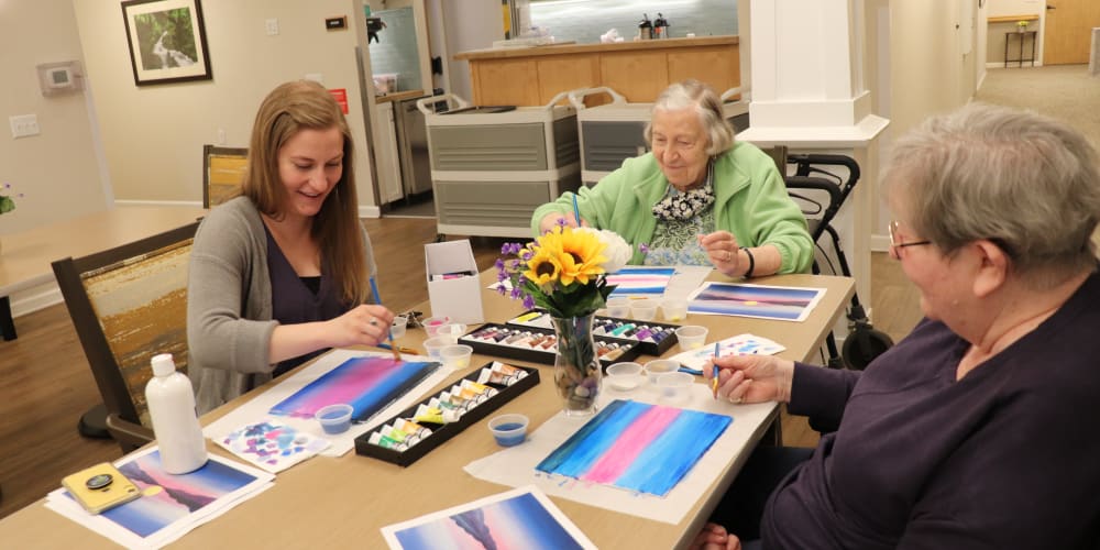 Residents enjoying an art class at The Springs at Clackamas Woods in Milwaukie, Oregon