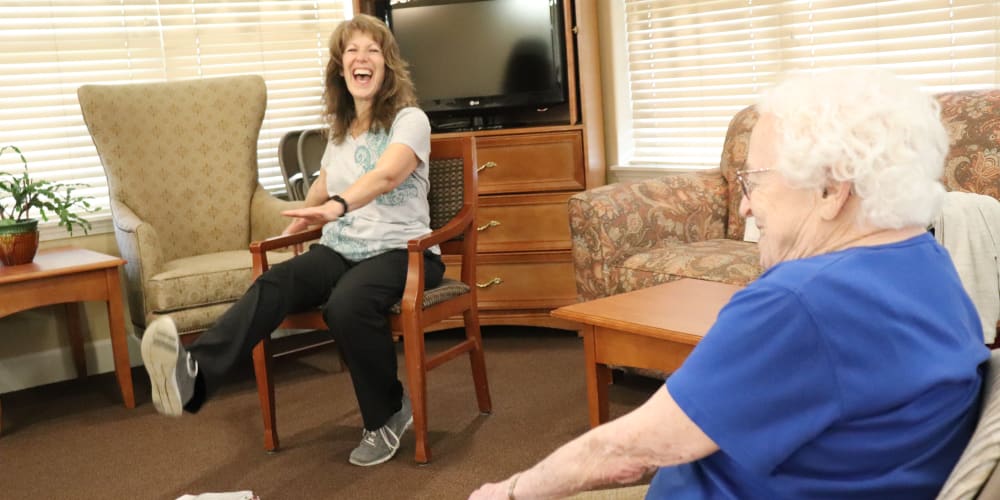 Resident exercising with caregiver at The Springs at Willowcreek in Salem, Oregon