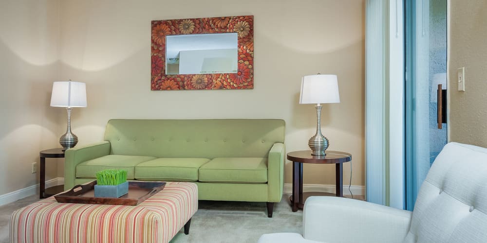 Classically furnished model home's living area at Shelter Cove Apartments in Las Vegas, Nevada