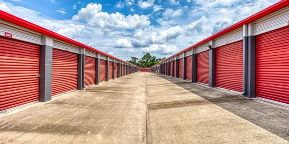 Wide driveways make accessing drive-up units easy at Devon Self Storage in Conroe, Texas
