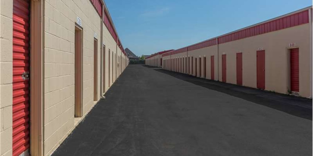 Wide driveways for quick and easy access to drive-up storage units at Devon Self Storage in Edmond, Oklahoma