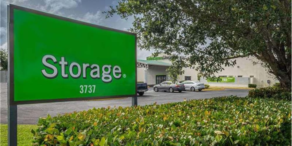 Sign welcoming new and existing tenants to Devon Self Storage in Port St. Lucie, Florida