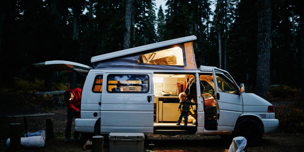 a family out camping in their camper van at Trojan Storage of Bothell North Creek in Bothell, Washington