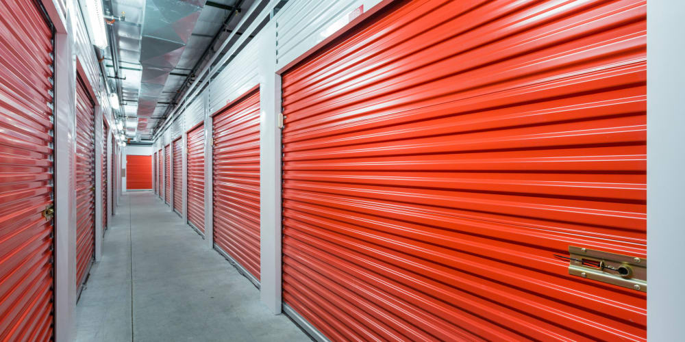 indoor units with orange doors at Trojan Storage of Lynnwood in Lynnwood, Washington