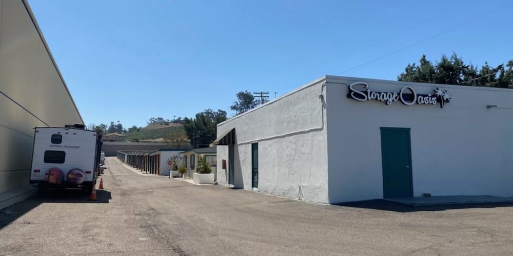 A wide driveway between the main building and units  at Storage Oasis in Santee, California