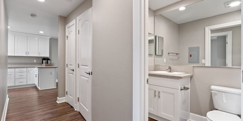 Bathroom and hallway storage closets in an apartment home at Vista Creek Apartments in Castro Valley, California