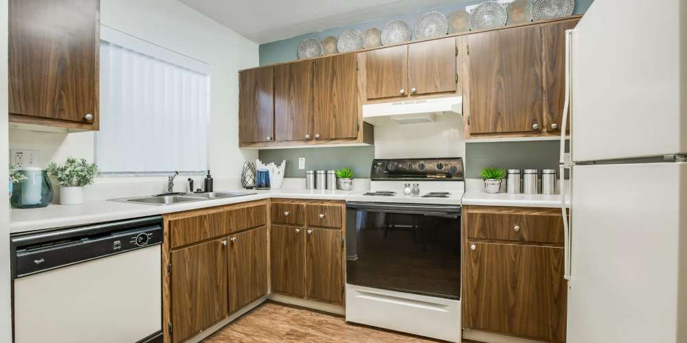 Full kitchen with major appliances at Briarcrest at Winter Haven in Winter Haven, Florida