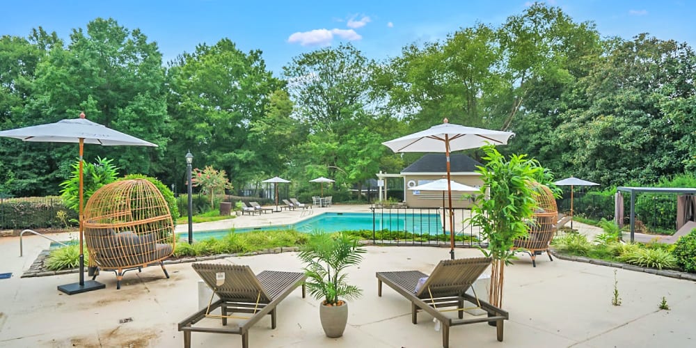 Poolside seating for residents at Five7Five in Austell, Georgia