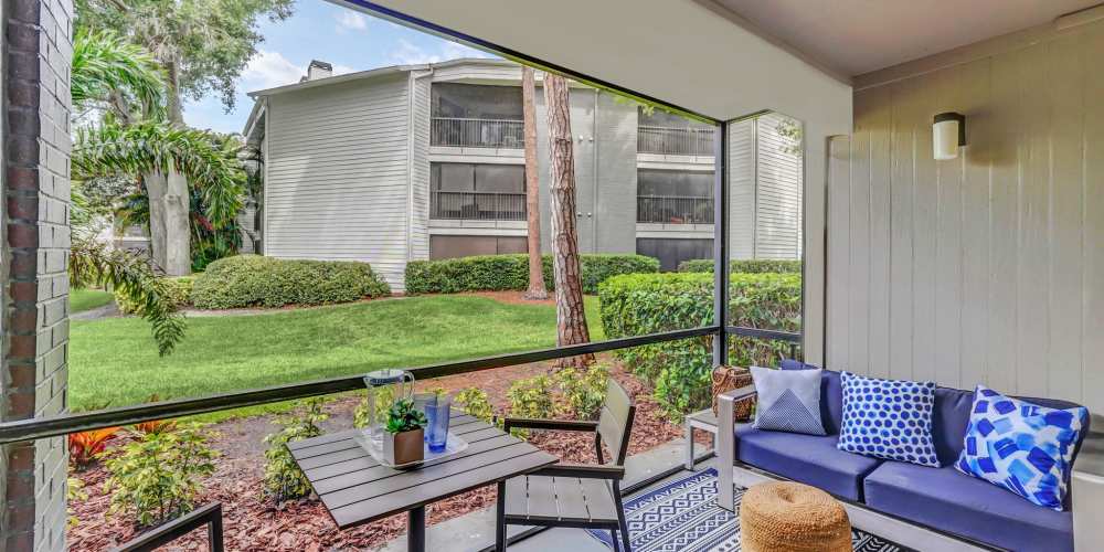 Screened-in apartment patio with outdoor furniture at 4800 Westshore in Tampa, Florida