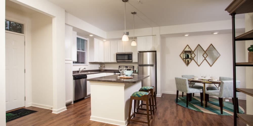 An open kitchen with an island at Cottages at Emerald Cove in Savannah, Georgia