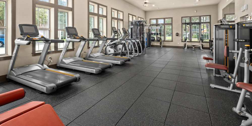 Community fitness center with treadmills at Station House at Lake Mary in Lake Mary, Florida