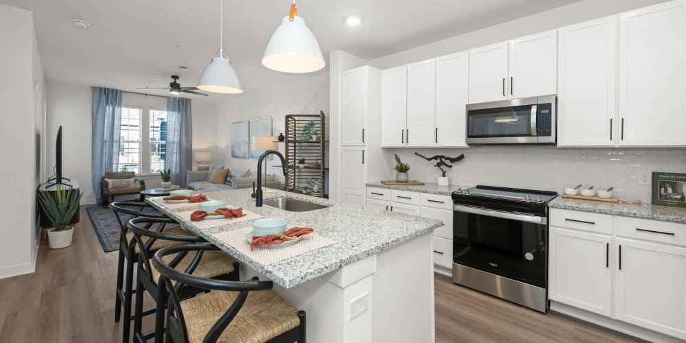 New and modern kitchens with islands at Olea Beach Haven in Jacksonville, Florida