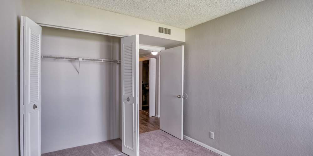 Wood-style flooring in an apartment bedroom at Costa Del Lago in Lake Worth, Florida
