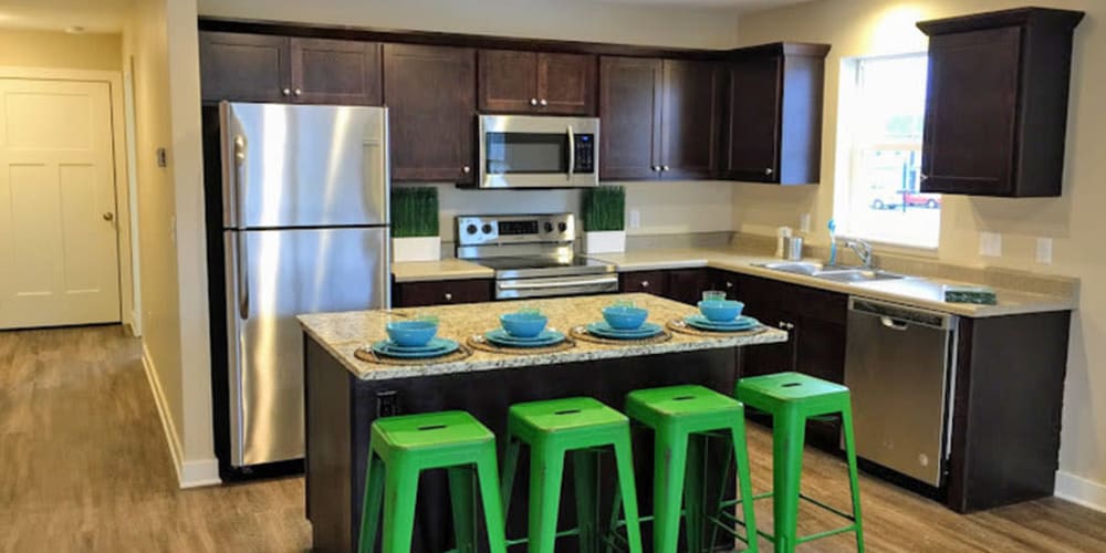 Kitchen at The Quarters at East Lansing Cottages in East Lansing, Michigan